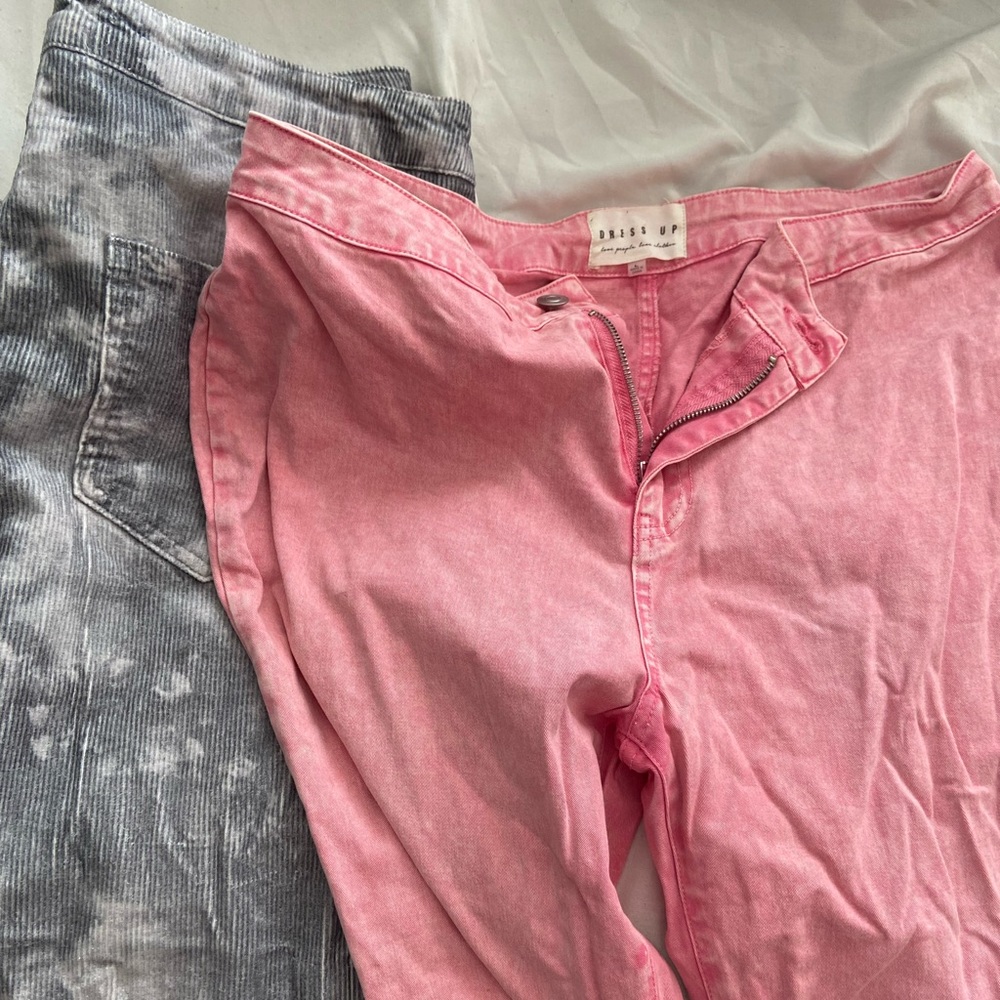 2 Dress Up bell bottom jeans.